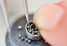 在机械设计中轴承与轴的配合，该用什么公差等级最合适